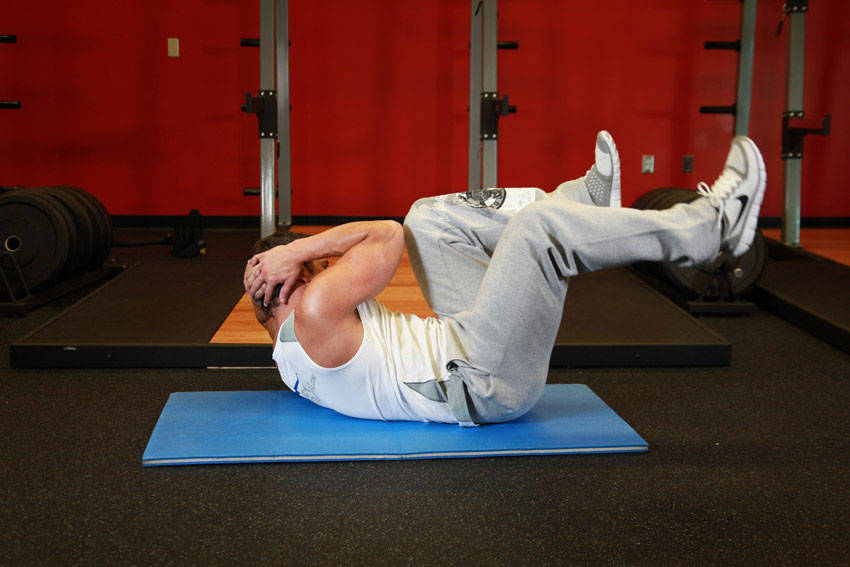 Abdominal bicicleta — posição final